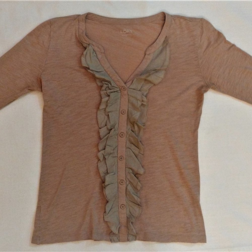 Light pink/tan blouse with a ruffle down the front